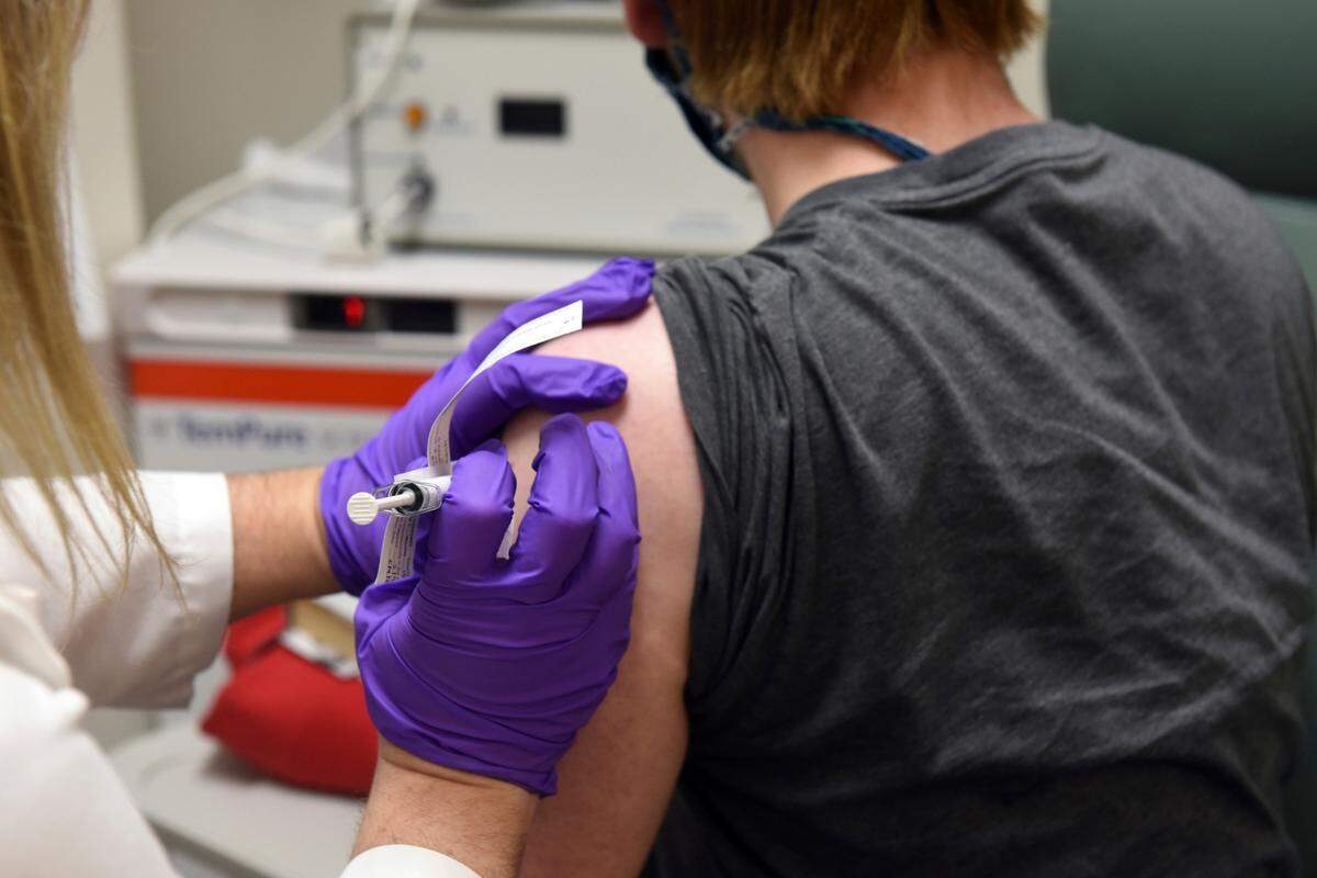 FILE - This May 4, 2020, file photo provided by the University of Maryland School of Medicine, shows the first patient enrolled in Pfizer’s COVID-19 coronavirus vaccine clinical trial at the University of Maryland School of Medicine in Baltimore. On Monday, Nov. 9, 2020, Pfizer said an early peek at its vaccine data suggests the shots may be 90% effective at preventing COVID-19. (Courtesy of University of Maryland School of Medicine via AP, File)