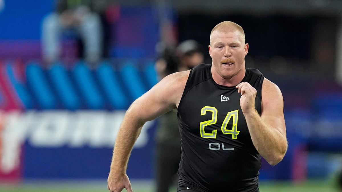 Nebraska offensive lineman Cam Jurgens runs a drill during the NFL football scouting combine, Friday, March 4, 2022, in Indianapolis. (AP Photo/Darron Cummings)