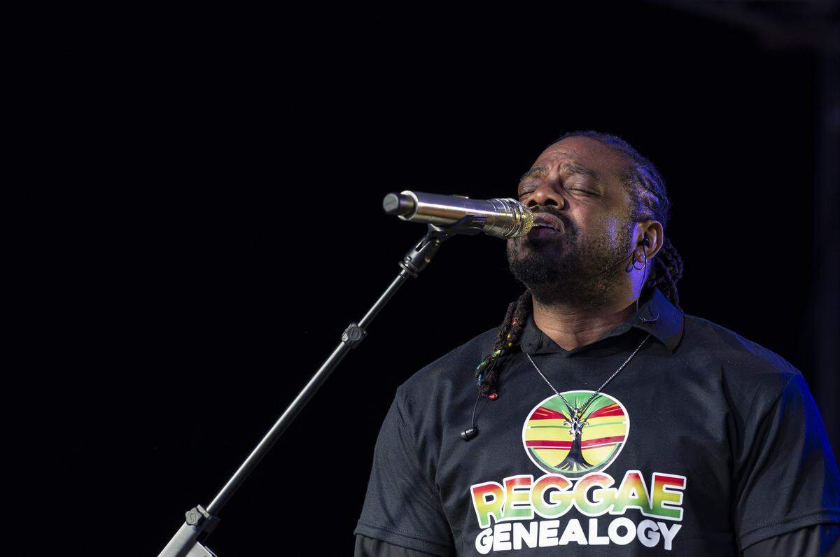 Singer Bobby Rose performs alongside the Code Red band during the Reggae Genealogy music festival.