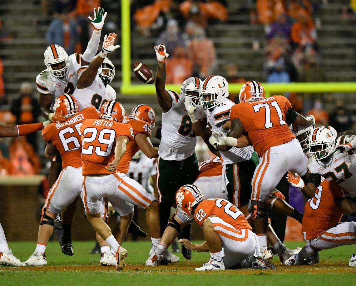Miami blocks a 61 yard field goal attempt by Clemson place kicker B.T. Potter (29) during the 2nd quarter during ClemsonÕs game against the University of Miami at Clemson’s Memorial Stadium Saturday, October 10, 2020. ACC Pool/Bart Boatwright/The Clemson Insider