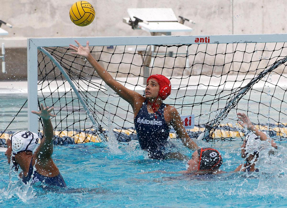Gulliver Prep goalkeeper Sophia Beltran saves a goal during the FHSAA Girls Water Polo State Championships final match against Seminole Noles (Sanford) on Saturday, April 26, 2025 at Gian Zumpano Aquatic Center in Miami. Andrew Uloza / for Miami Herald