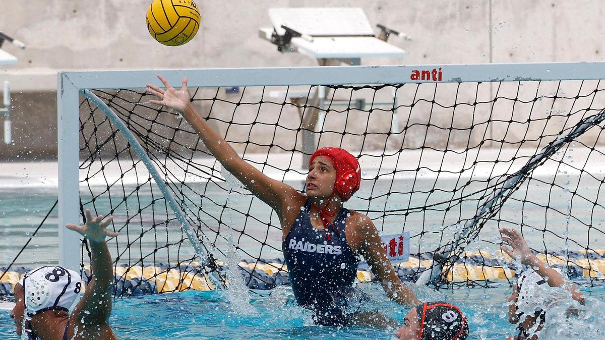 Gulliver Prep goalkeeper Sophia Beltran makes a save during the FHSAA Girls Water Polo State Championships final match against Seminole on Saturday, April 26, 2025 at Gian Zumpano Aquatic Center in Miami. 
