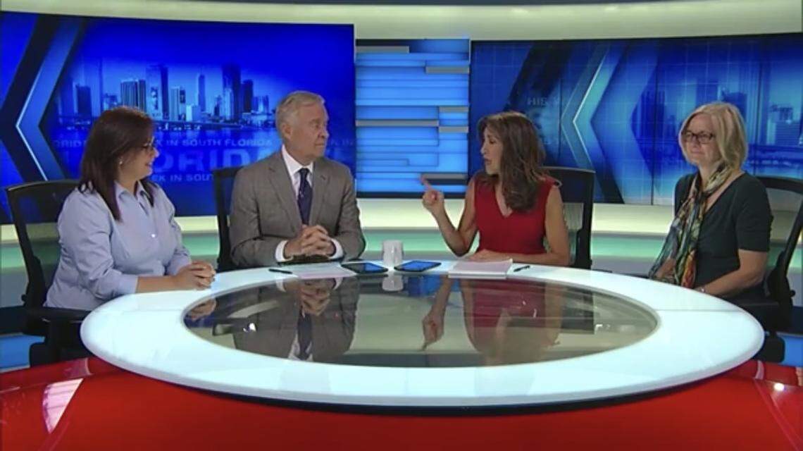 Glenna Milberg, second from right, asks a question during a debate on WPLG's "This Week in South Florida" between the two candidates for the District 5 seat on the Miami-Dade County Commission. The candidates, Zoraida Barreiro, left, and Eileen Higgins, right, disagree on whether to extend the 836 expressway into Kendall. The runoff election is June 19. Michael Putney, second from left, also moderated the debate, which aired Sunday, June 10, 2018.