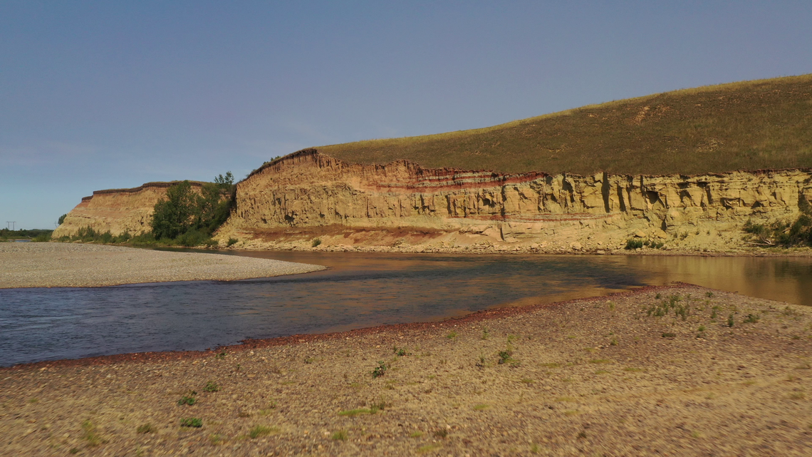 Along the Kiya River in western Siberia, a chunk of rock fell from a cliff and revealed a secret millions of years old.