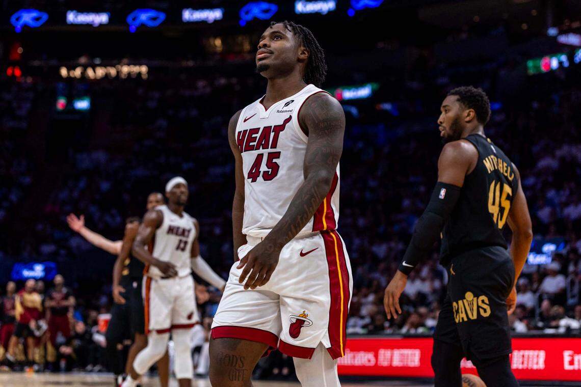 Miami Heat guard Davion Mitchell (45) reacts to a play during the first half of Game 4 of the Eastern Conference NBA Playoffs against the Cleveland Cavaliers at Kaseya Center on April 28, 2025, in Miami.