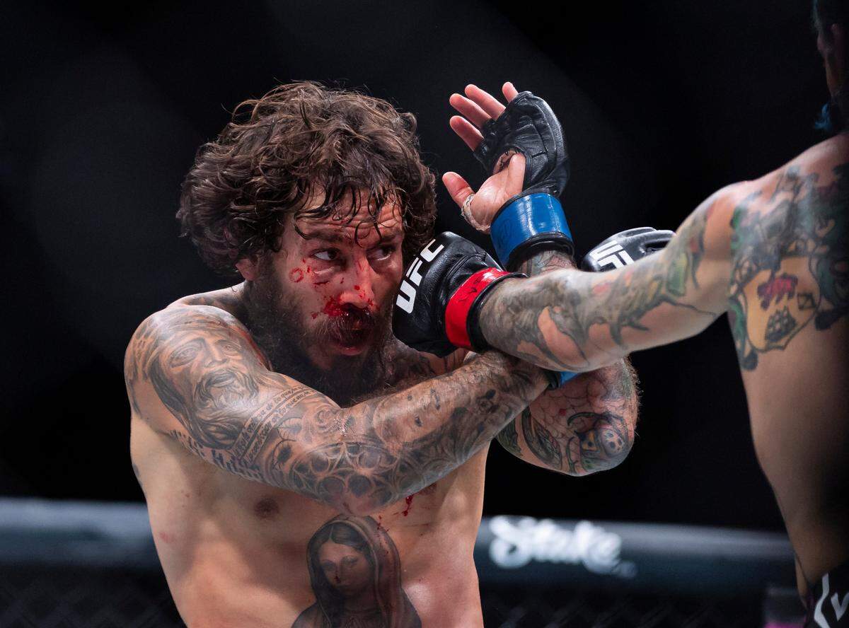 Sean O’Malley of the United States fights against Marlon Vera of Ecuador during their bantamweight title match during the UFC 299 event at the Kaseya Center on Saturday, March 9, 2024, in downtown Miami, Fla.
