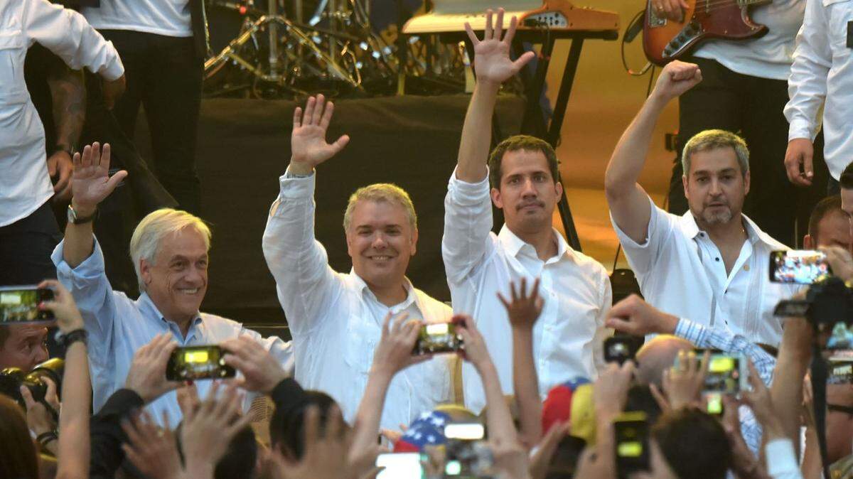 Venezuela’s interim president, Juan Guaidó, third from left, stands with Chilean President Sebastián Piñera, Colombian President Iván Duque and Paraguayan President Mario Abdo Benítez at the Venezuela Aid Live concert in Cúcuta, Colombia, last month..