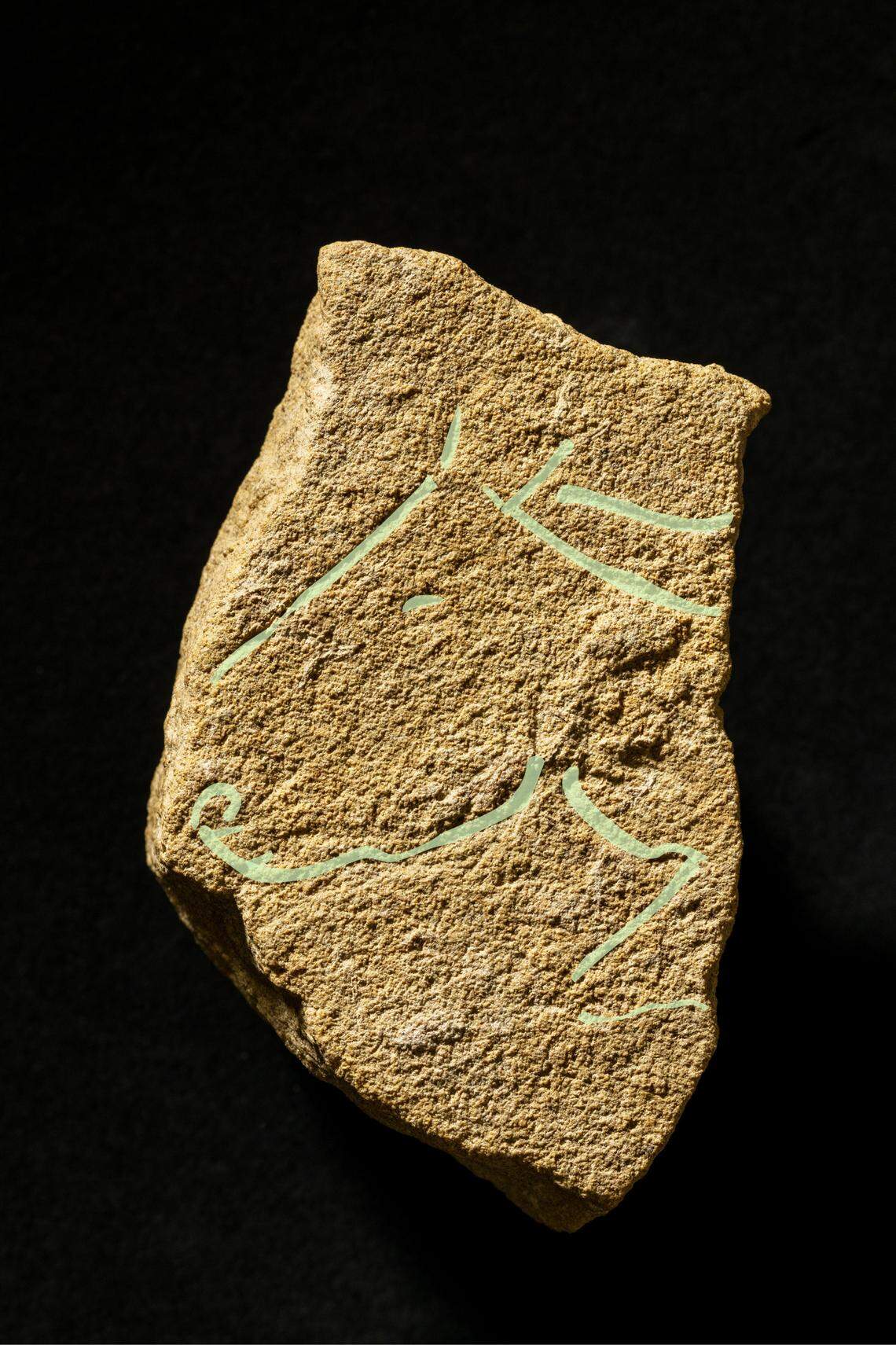 Highlights show the shape of the horse carving.