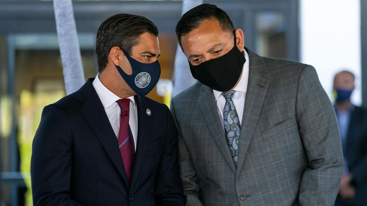 City of Miami Mayor Francis Suarez, left, talks with Art Acevedo during a press conference at Miami City Hall on Monday, March 15, 2021. It was announced Acevedo would be the city’s new police chief.