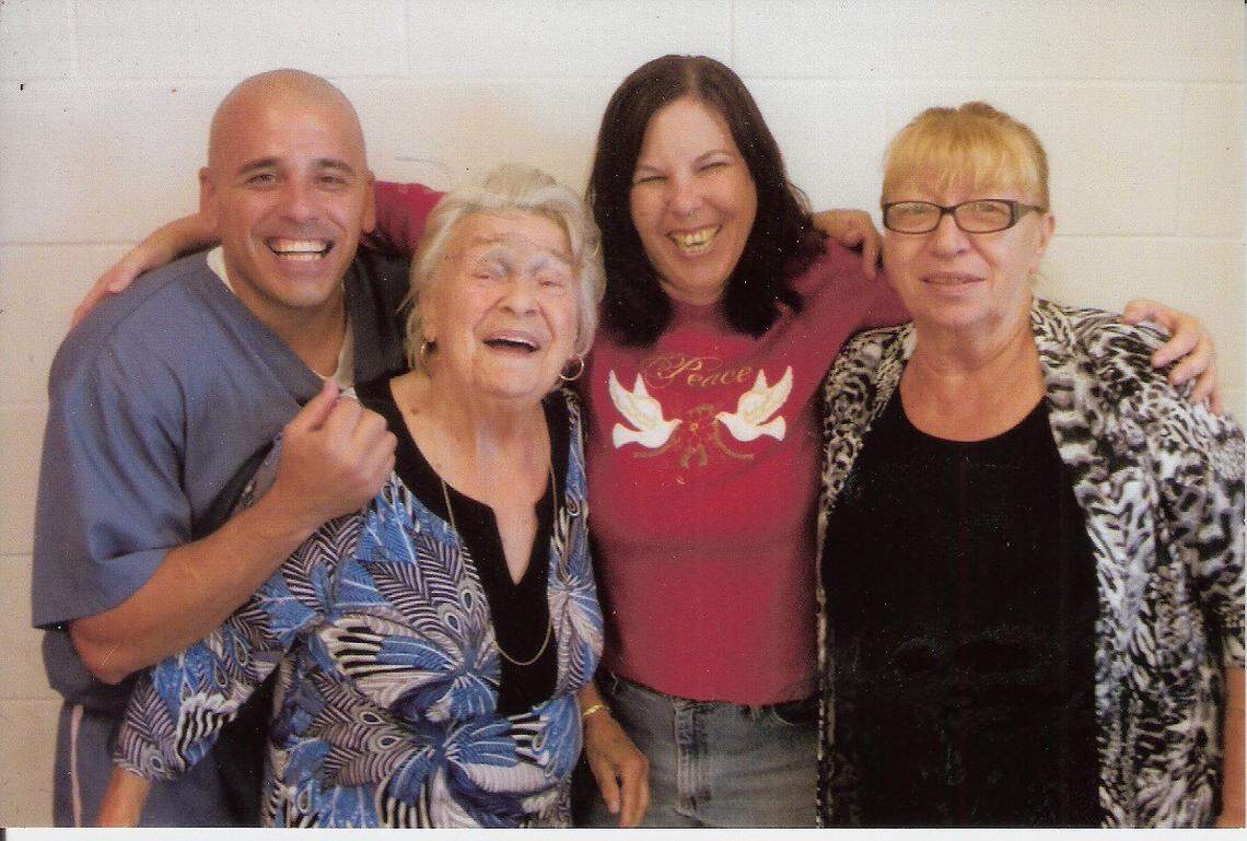 Thomas Tinghino pictured with his grandmother, sister and mother