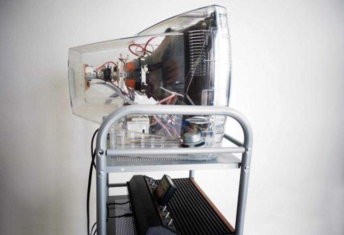 The artist uses TV sets with clear casings in some of his works, including in “Atari Poetry VI” (2006). The TVs were originally used in prisons.