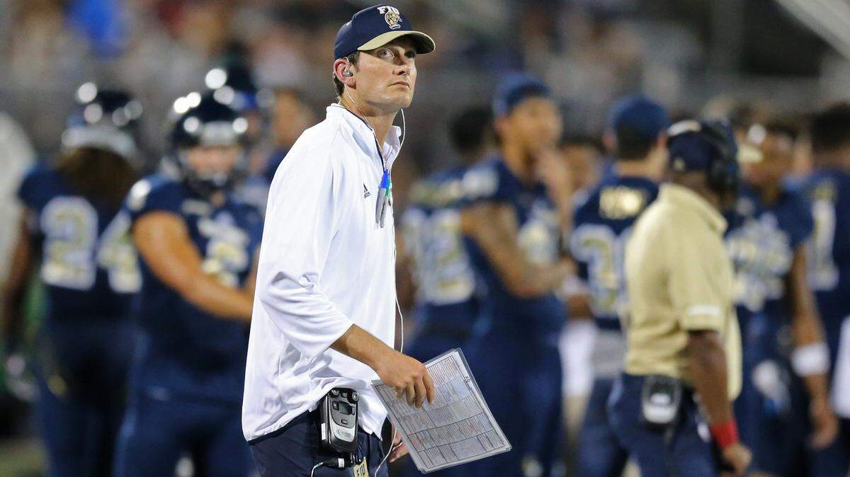 FIU assistant athletic director and former University of Miami quarterback Ken Dorsey on the sidelines of FIU’s win against UMass in September. Dorsey, a former NFL assistant, is returning to coaching.