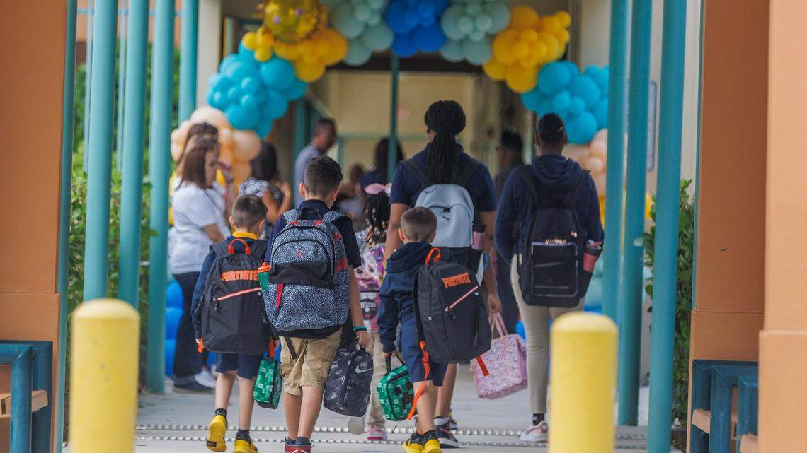 Students enter the Bob Graham Education Center in Miami Lakes on the first day of school for Miami-Dade County Public Schools on Thursday, Aug. 17, 2023.
