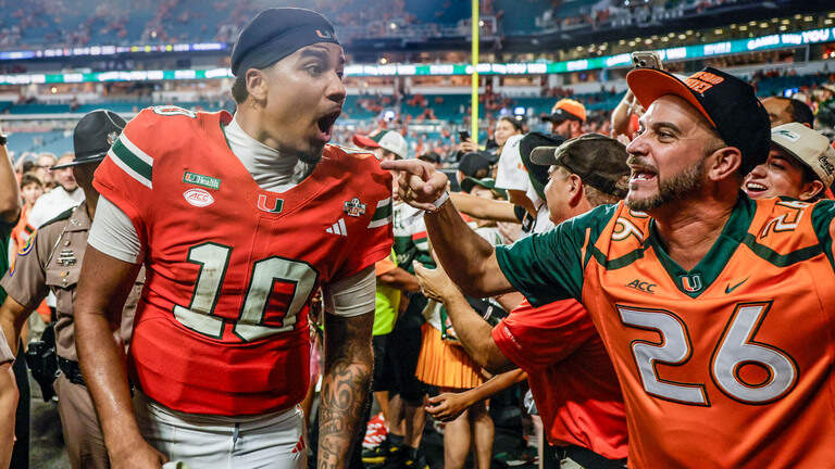PHOTO GALLERY: No. 3 Miami Hurricanes defeat Florida State Seminoles in double-overtime win