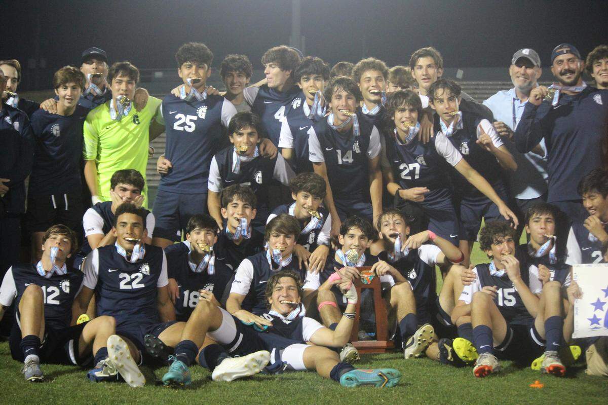 Gulliver’s boys’ soccer team celebrates after beating Orlando Bishop Moore 3-2 on Thursday night at Spec Martin Stadium in DeLand and secure its eighth state championship all-time.