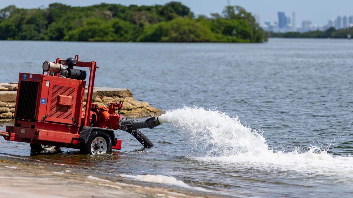 A pump oxygenates water back into Biscayne Bay in Morningside Park in response to a the fish kill caused by low oxygen levels in the water.