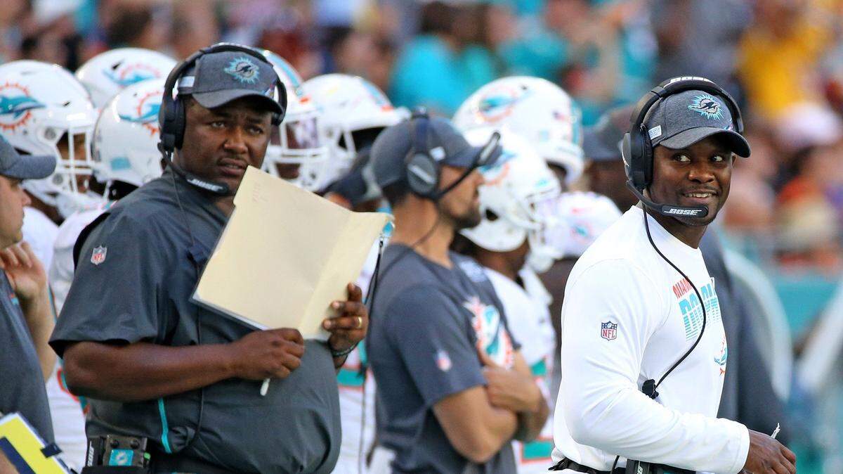 Miami Dolphins defensive coordinator Patrick Graham and coach Brian Flores as they play the Washington Redskins at Hard Rock Stadium in Miami Gardens, Florida, Sunday, October, 13, 2019.