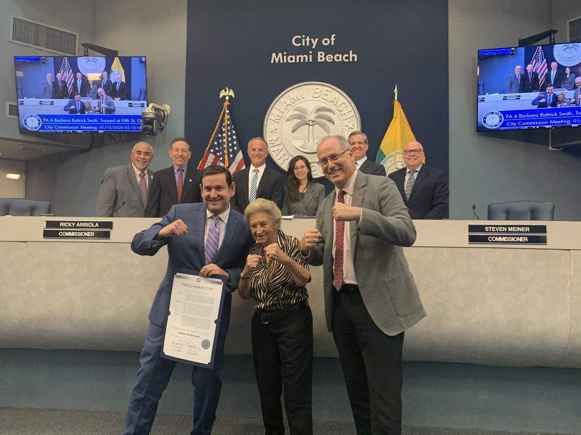 Michael Góngora, front left, poses for a photo with Miami Beach resident and retired British boxer Barbara Buttrick in 2020. Góngora is running for mayor in November to replace Dan Gelber, front right, who is term-limited.