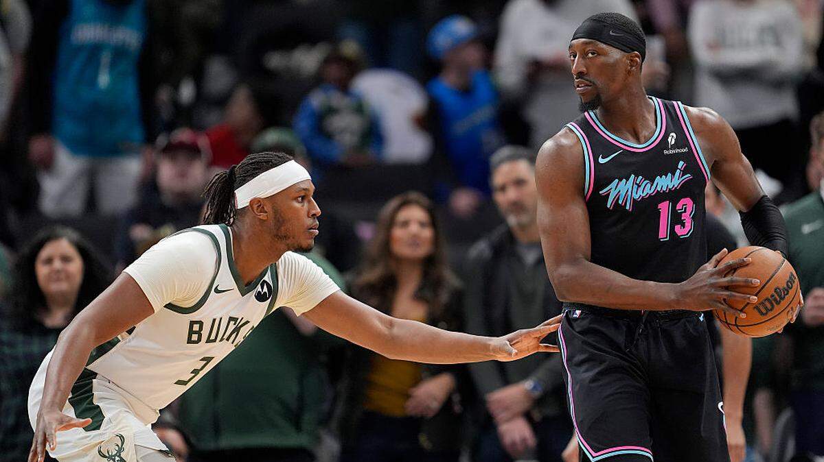 Myles Turner #3 of the Milwaukee Bucks defends Bam Adebayo #13 of the Miami Heat during the first quarter at Fiserv Forum on February 24, 2026 in Milwaukee.