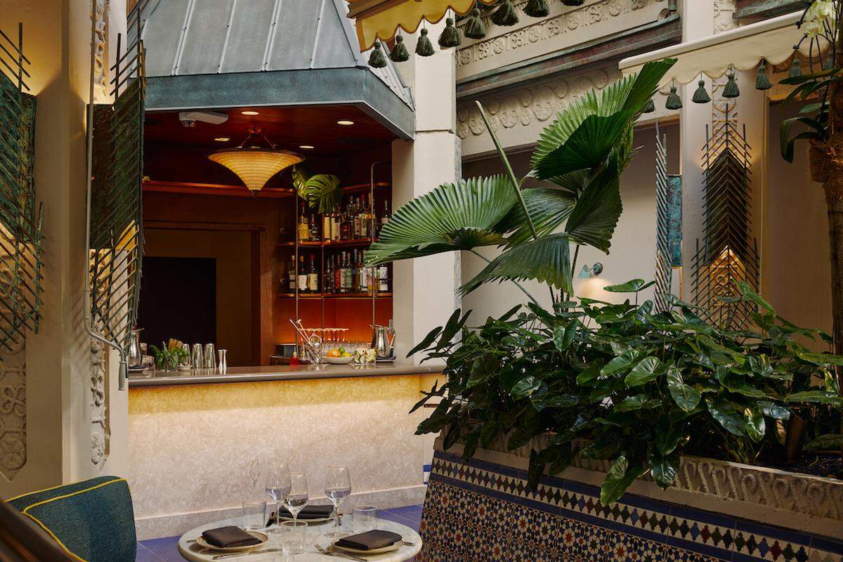 The Fountain Bar in the atrium of the renovated Mayfair hotel.