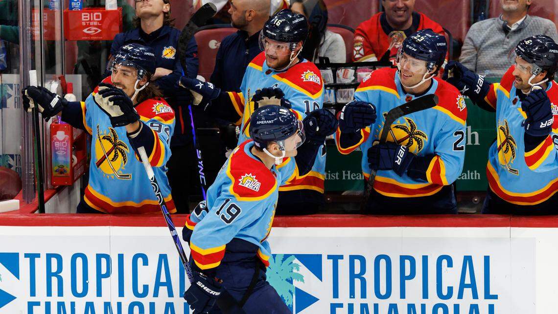 Florida Panthers left wing Matthew Tkachuk (19) celebrate with the bench after scoring a goal during the third period of an NHL game against Calgary Flames at FLA Live Arena on Saturday, November 19, 2022 in Sunrise, Fl.