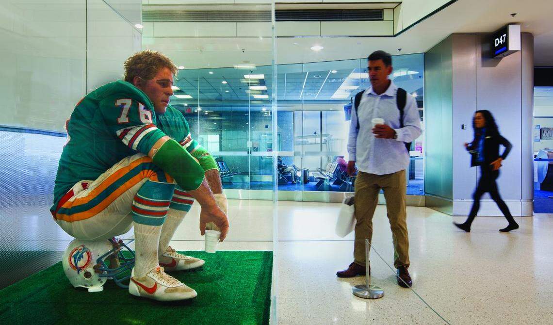 Travelers passing Miami International Airport’s gate D47 can see “The Football Player,” the iconic, hyperrealist sculpture created in 1981 by American artist Duane Hanson. 