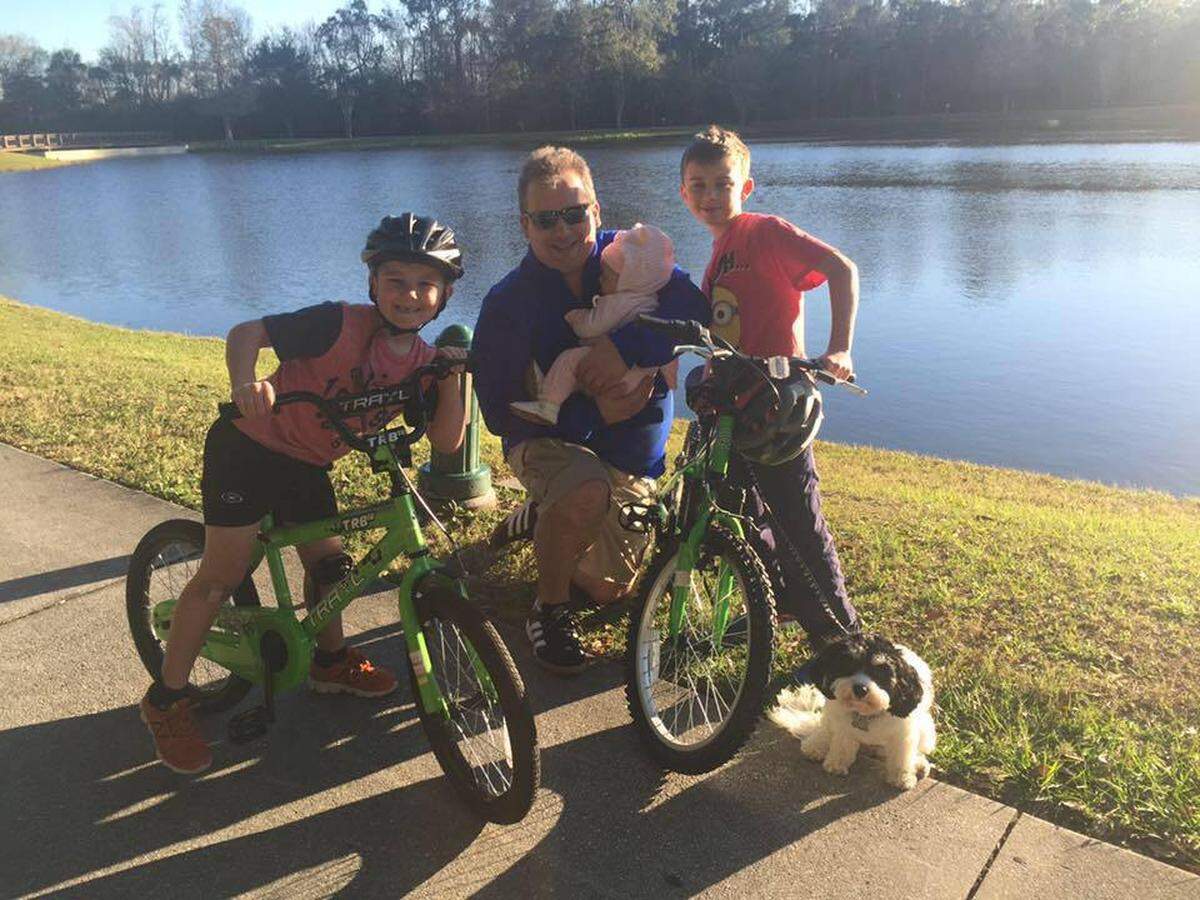 Anthony Todt surrounded by his children Alek Todt, Tyler Todt, Zoe Todt and dog Breezy.