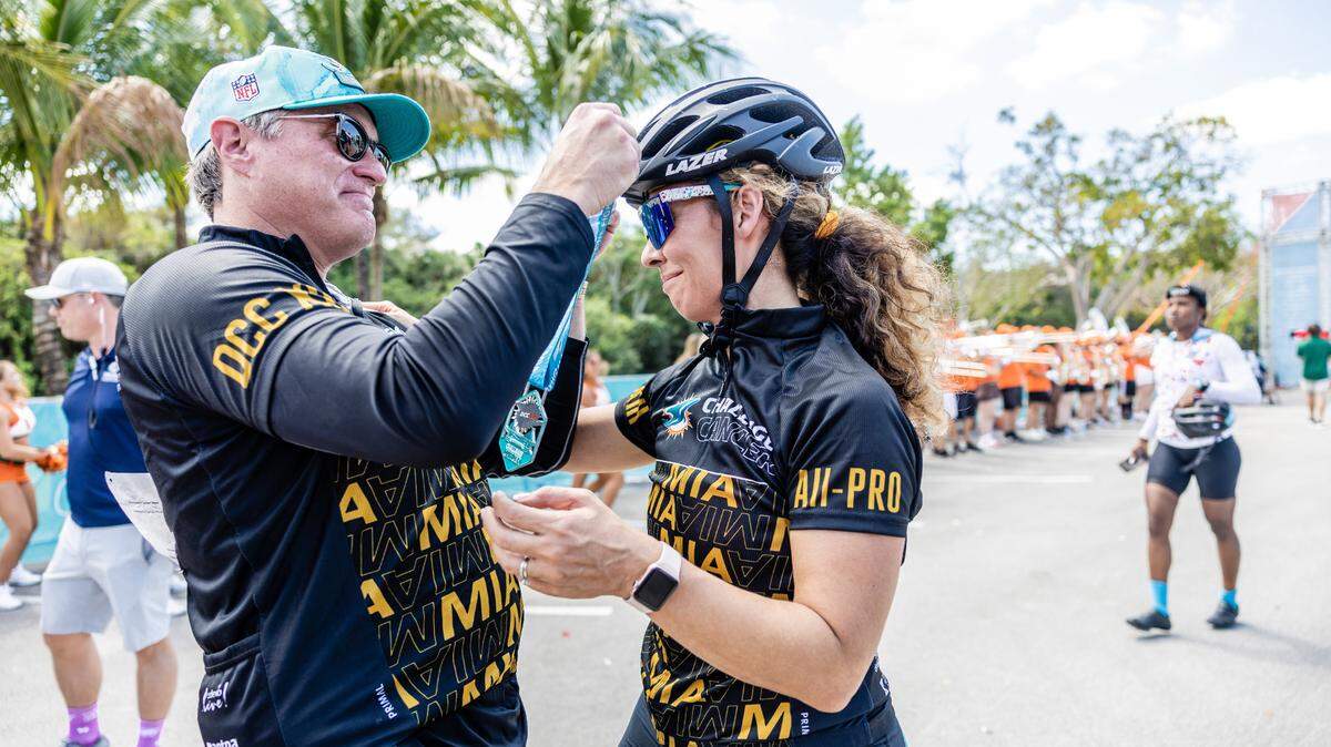 Miami Dolphins President and CEO Tom Garfinkel with Liz Jenkins during the 13th DCC in South Florida on Saturday, February 25th, 2023 (Brennan Asplen/Miami Dolphins)