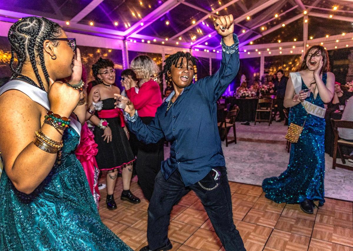 The Prom King, Eris Coney, 18, a student at Law Enforcement Officers’ Memorial High School, dances with fellow students at Safe Schools South Florida’s prom for queer youth. The event offered them the full prom experience in a welcoming and affirming space at Vizcaya Museum and Gardens in Miami, Florida, on Saturday, May 31, 2025.