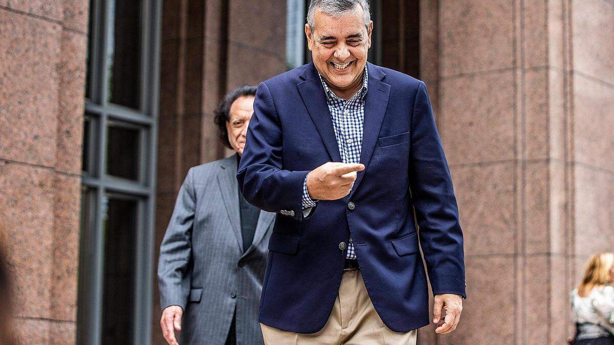 Former U.S. Rep. David Rivera walks out of court after his first federal court appearance in Miami on Tuesday, Dec. 20, 2022. He is facing charges of operating as an unregistered foreign agent for  Venezuela when Nicolás Maduro was president.