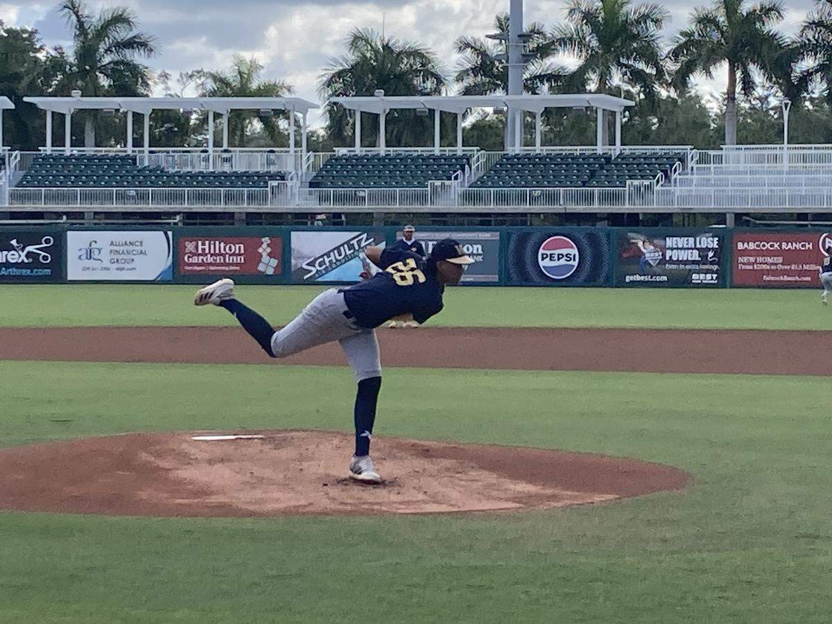 Schoolhouse Prep pitcher Angel Delgado fires a pitch to the plate during Thursday’s Class 1A state semifinal against Orange Park St. Johns Country Day at Hammond Stadium in Fort Myers, Fla.