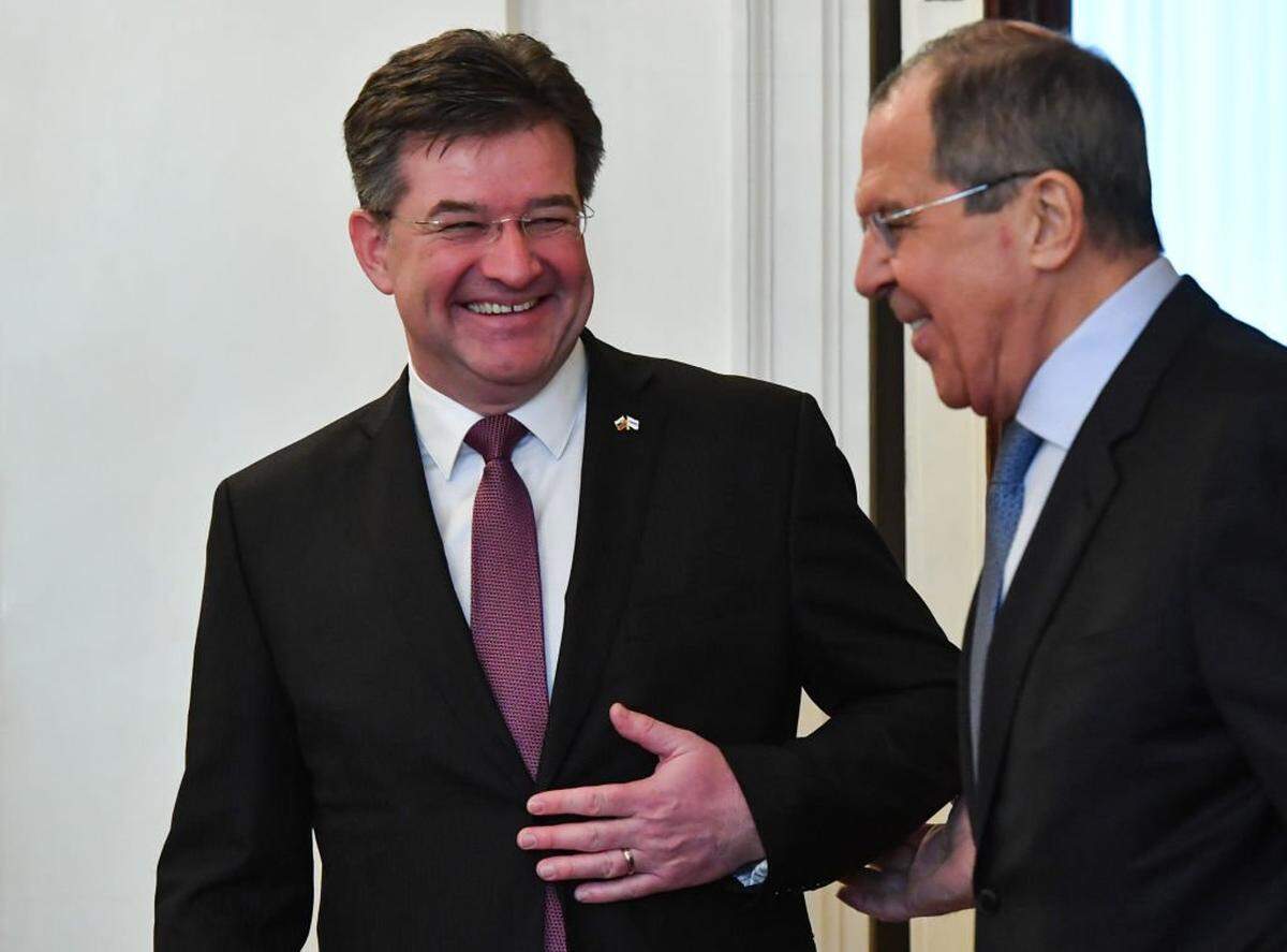 Russian Foreign Minister Sergei Lavrov (R) shows the way to his Slovak counterpart and OSCE Chairperson in Office Miroslav Lajcak during a meeting in Moscow on February 19, 2019. (Photo by YURI KADOBNOV/AFP via Getty Images)