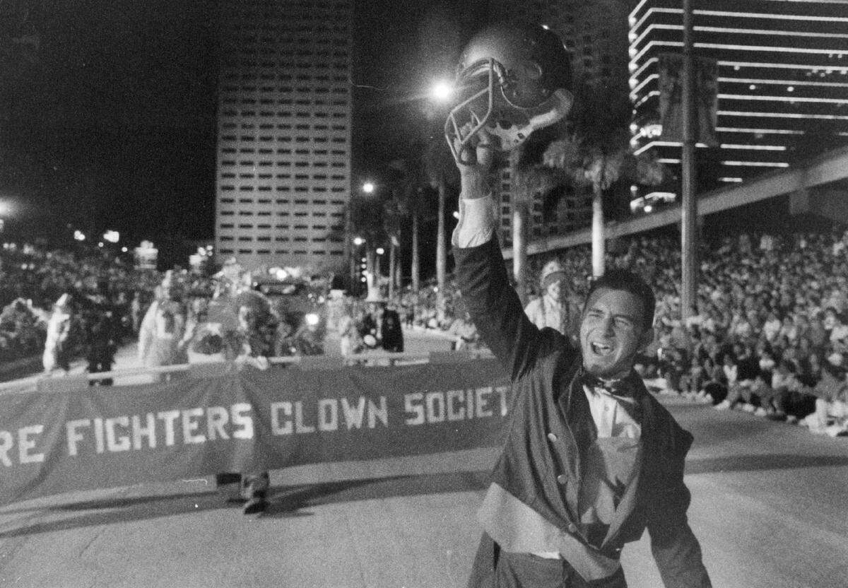 A cheer for Notre Dame at the Orange Bowl Parade in 1990.