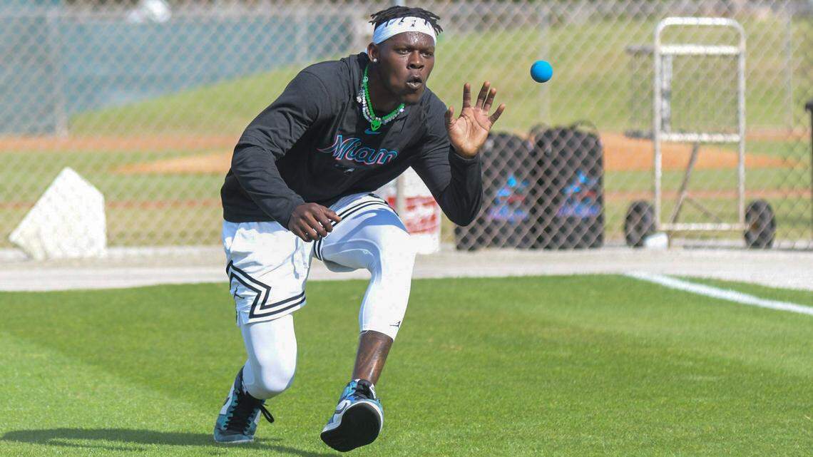 Miami Marlins center fielder Jazz Chisholm Jr. goes through a fielding drill on Feb. 17, 2023, on the back fields of the Roger Dean Chevrolet Stadium complex in Jupiter, Florida.