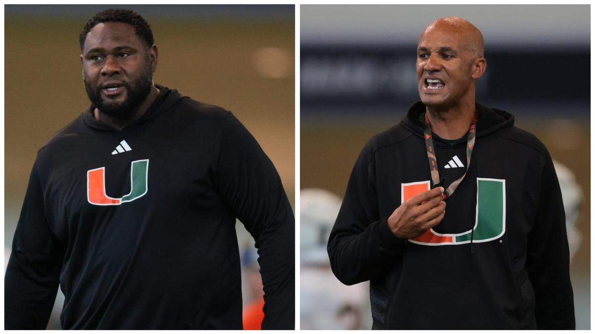 Miami Hurricanes defensive tackles coach Damione Lewis (left) and defensive line coach Jason Taylor (right) look on during spring practice at the Carol Soffer Indoor Practice Facility at the University of Miami in Coral Gables, Florida, Thursday, March 20, 2025.