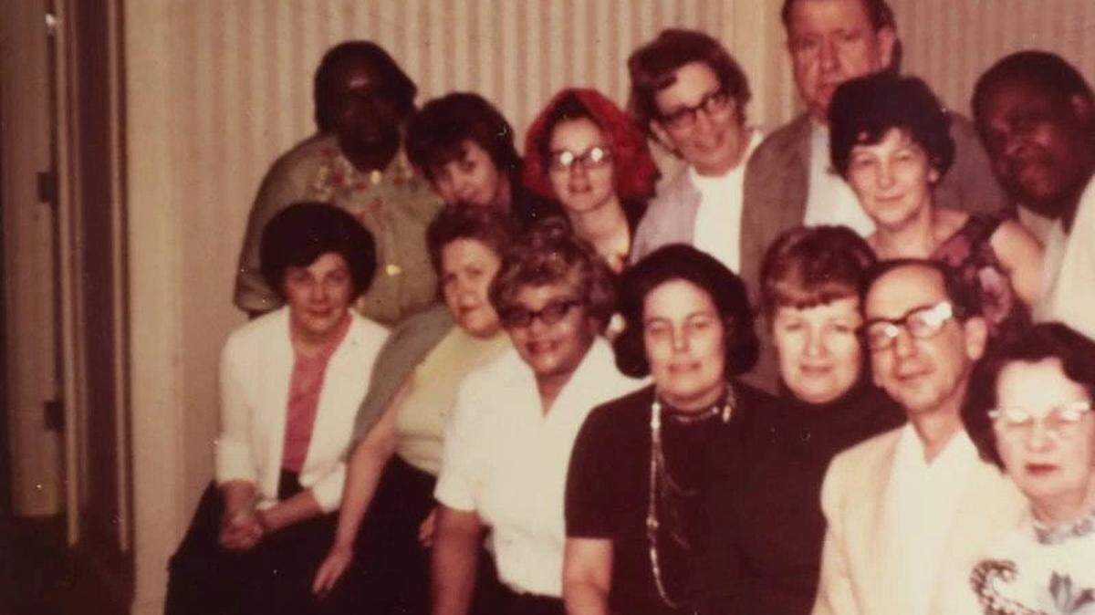 A family photo belonging to Margie Fritz-Birch, shows her mother, Jean Fritz, back row, second from left, with fellow jurors who heard the Chicago 7 conspiracy trial after the 1968 Democratic National Convention.