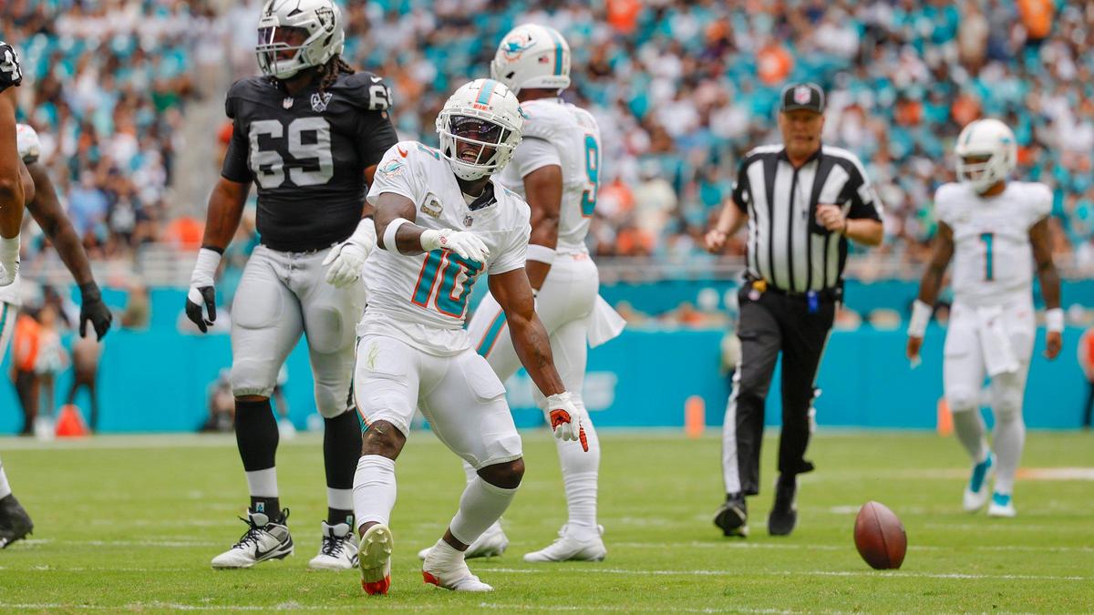 Miami Dolphins wide receiver Tyreek Hill (10) reacts after a first down against the Las Vegas Raiders in the first half of their NFL game in Miami Gardens, Florida on Sunday, November 17, 2024.