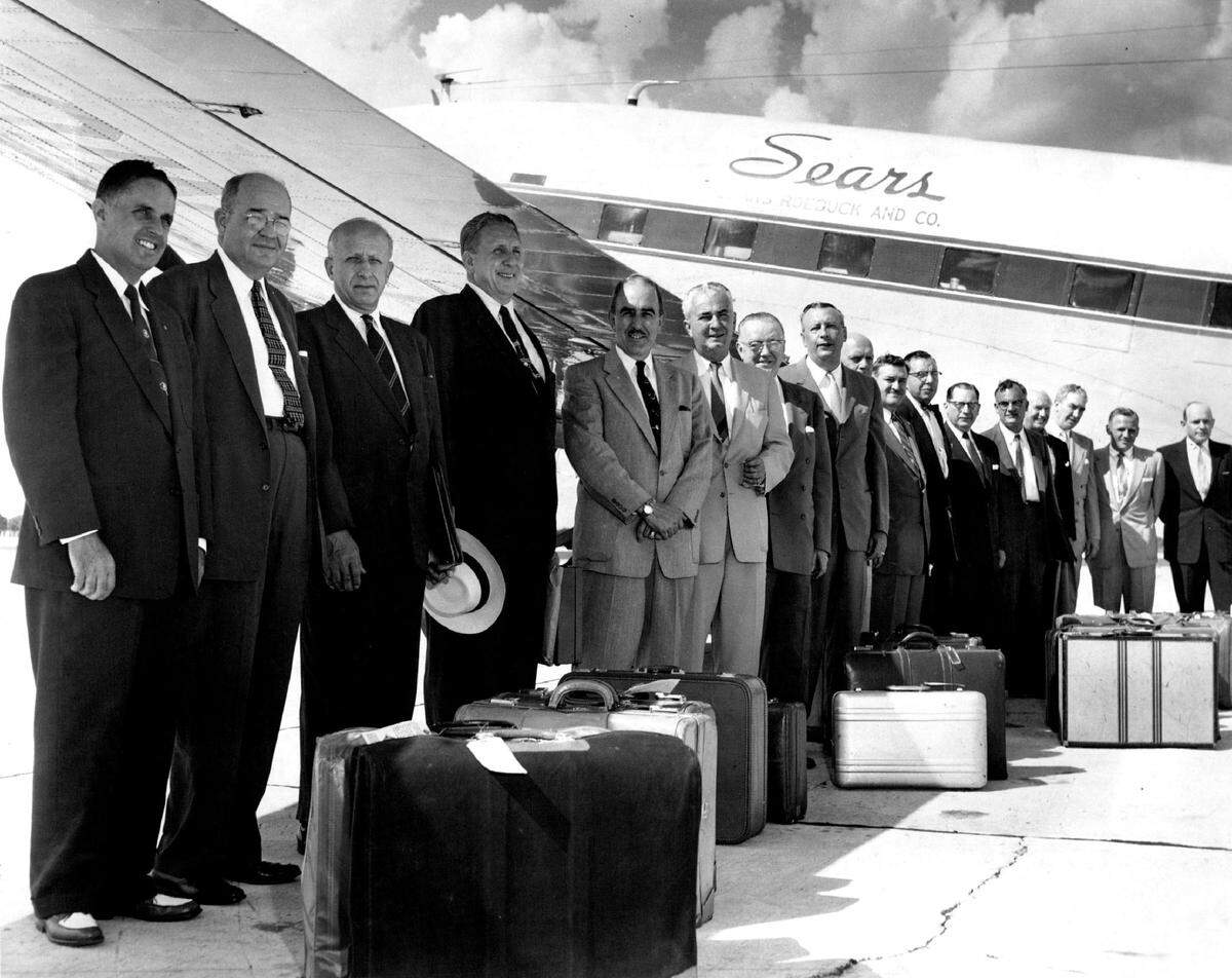 Sears executives arrive at the Broward airport in 1955 for the opening of the Sears Town Shopping Center in Fort Lauderdale.