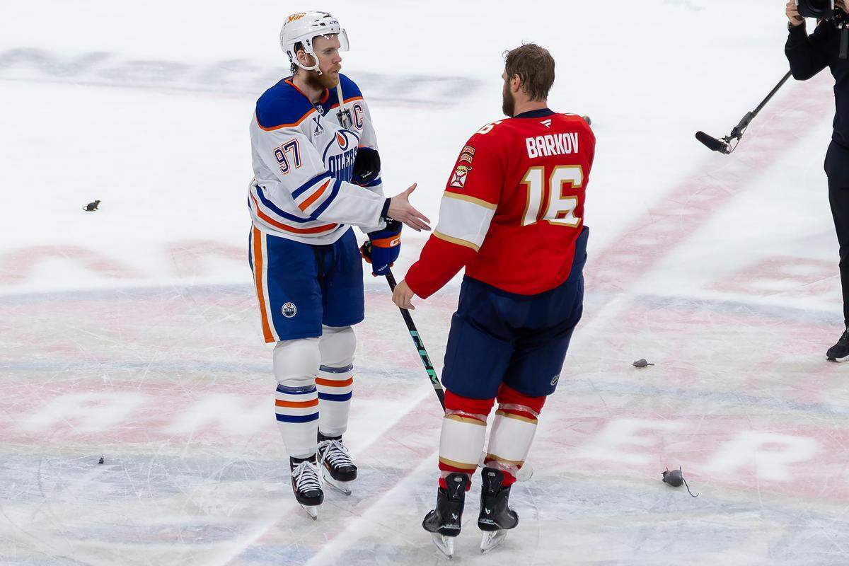 Florida Panthers center Aleksander Barkov (16) shakes hands with Edmonton Oilers center Connor McDavid (97) after the Panthers defeated the Oilers 5-1 in Game 6 of the Stanley Cup Final at Amerant Bank Arena on Tuesday, June 17, 2025, in Sunrise, Fla., to clinch the NHL championship.