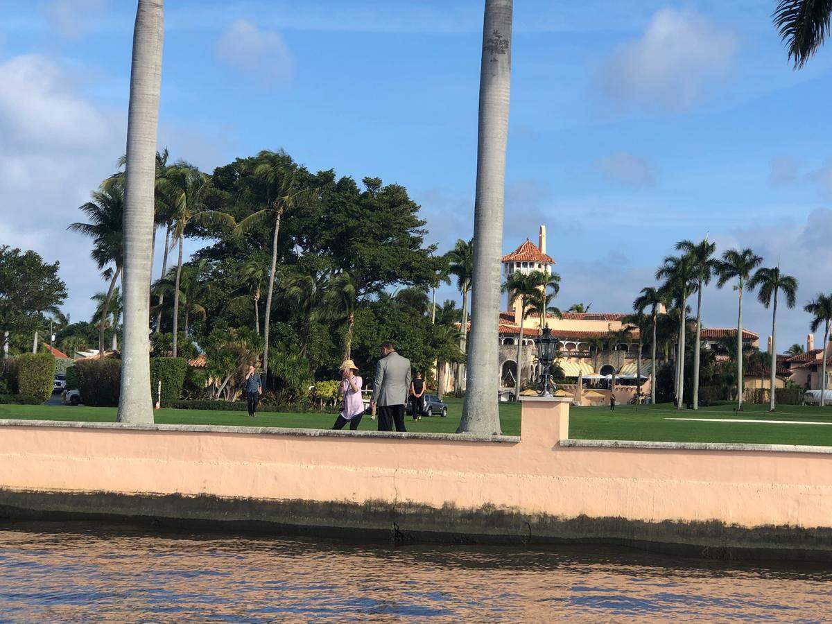 Chinese fugitive billionaire Guo Wengui was photographed by activist Claude Taylor as Guo walked his dog outside Mar-a-Lago in late December 2018.