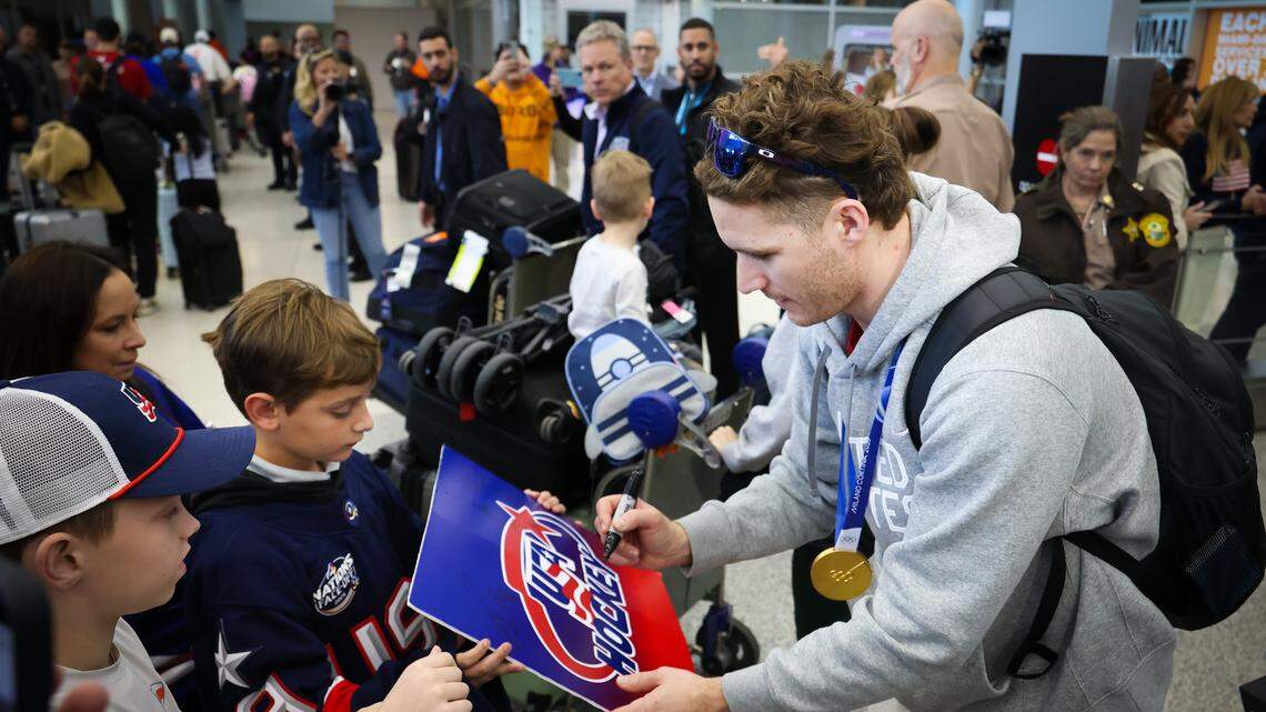 ‘So excited to be back:’ USA men’s hockey welcomed home at MIA after winning gold
