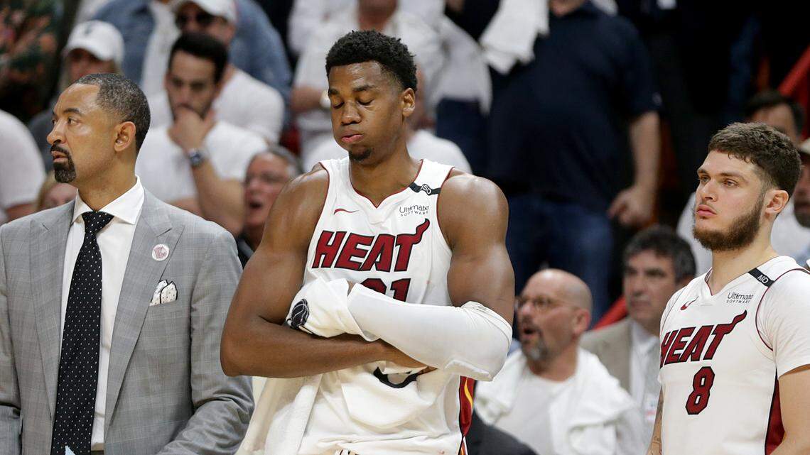 The Heat's Hassan Whiteside, center, reacts as Philadelphia leads with less than a minute left in the fourth quarter of Game 4 of the first-round playoff game between the Miami Heat and the Philadelphia 76ers, at AmericanAirlines Arena in Miami on Saturday, April 21, 2018.