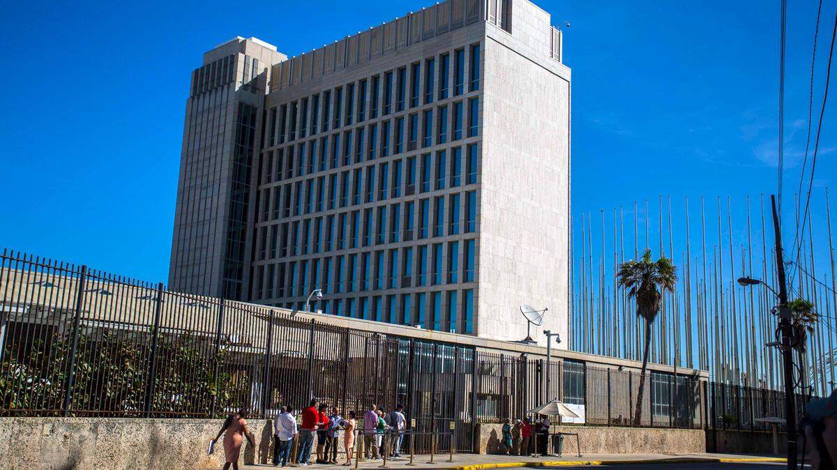 Cubans line up outside the U.S. Embassy in Havana in November 2016. Now visa-issuing operations at the embassy are at a virtual standstill.
