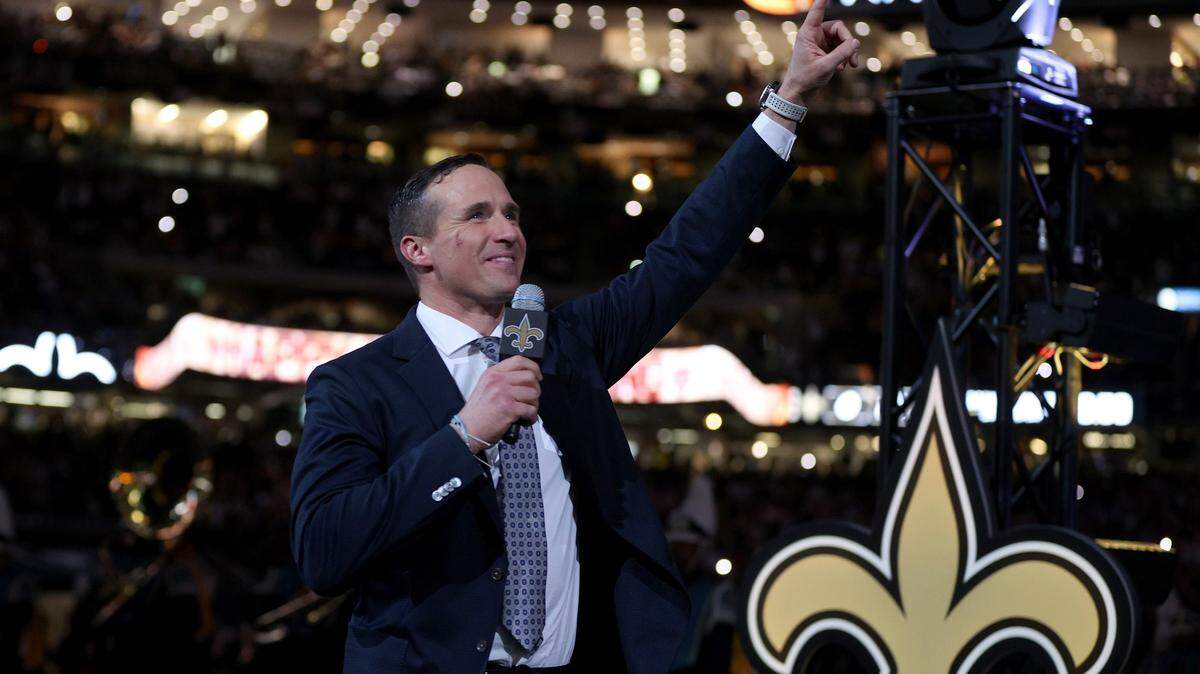 NEW ORLEANS, LOUISIANA - NOVEMBER 25: Former New Orleans Saints quarterback Drew Brees speaks to the fans during halftime of the game between the Buffalo Bills and the New Orleans Saints at Caesars Superdome on November 25, 2021 in New Orleans, Louisiana. (Photo by Chris Graythen/Getty Images)
