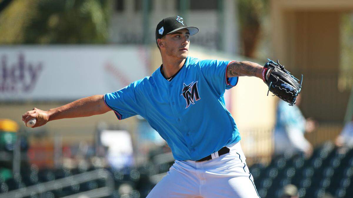 Miami Marlins pitcher Jordan Holloway (78) pitches during the fifth inning of a Major League Baseball spring training game against the Atlanta Braves at the Roger Dean Chevrolet Stadium on Wednesday, March 6, 2019 in Jupiter, FL.