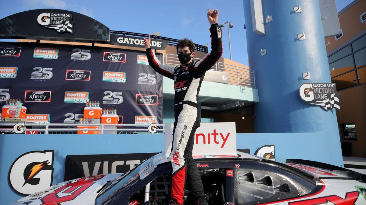 Harrison Burton, driver of the #20 DEX Imaging Toyota, celebrates in Victory Lane after winning the NASCAR Xfinity Series Hooters 250 at Homestead-Miami Speedway on June 13, 2020 in Homestead, Florida.