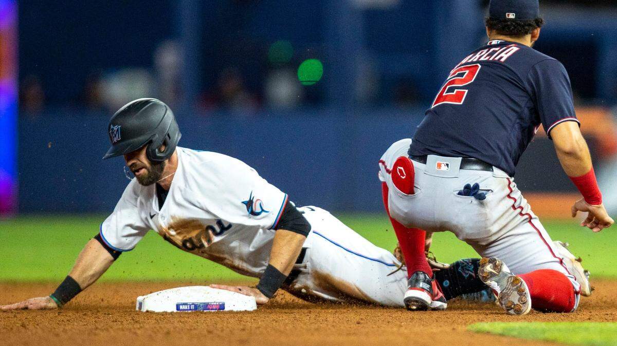 Miami Marlins base runner Jon Berti (5) successfully steals second base during the ninth inning of an MLB game against the Washington Nationals at loanDepot park in the Little Havana neighborhood of Miami, Florida, on Wednesday, June 8, 2022.