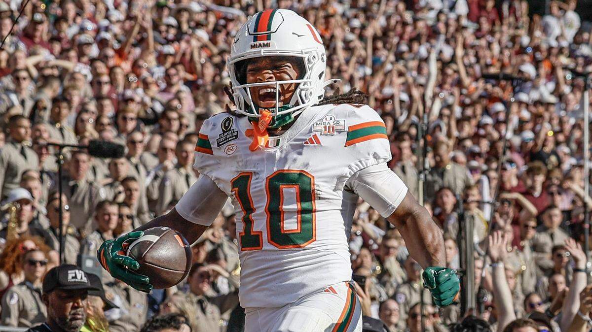 Miami Hurricanes wide receiver Malachi Toney (10) scores the winning touchdown in the fourth quarter against Texas A&M Aggies in the first round of the 2025 College Football Playoff at Kyle Field at College Station, Texas, on Saturday, December 20, 2025. 