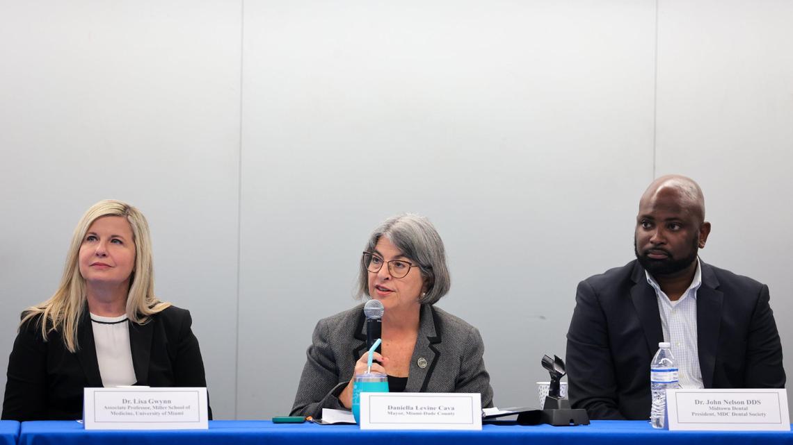 Flanked by doctors who back putting fluoride in drinking water, Miami-Dade County Mayor Daniella Levine Cava presided over a roundtable on Monday, April 7, 2025, that featured health professionals endorsing fluoridation as safe and vital for protecting teeth, particularly in children from low-income families. Dr. Lisa Gwinn, a University of Miami pediatrician, sits to Levine Cava’s right and Dr. John Nelson, president of the Miami-Dade Dental Society, sits to her left.