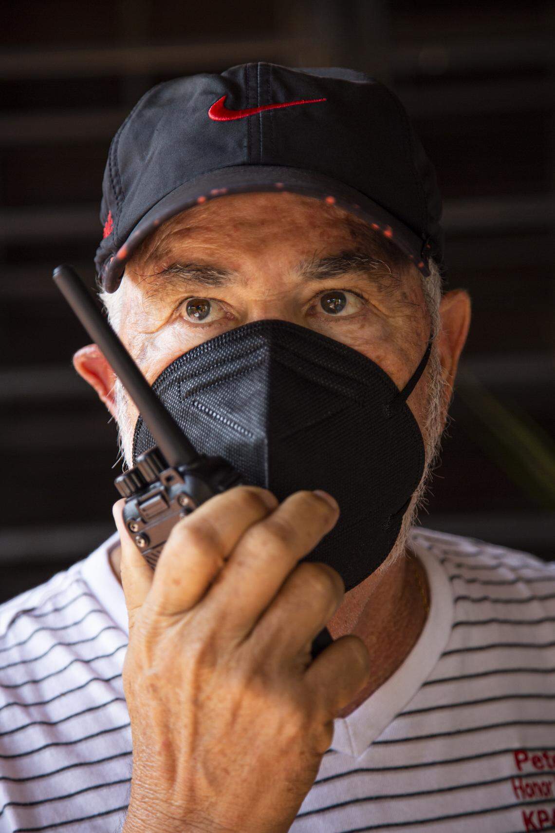 Pedro Labayen, founder of the Radio Amateur Association of Utuado, uses a hand radio at his home on June 4, 2021, in Utuado, Puerto Rico.